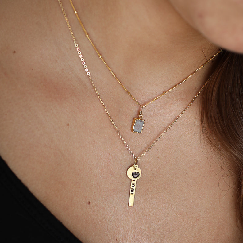 "Je t'aime," French for "I Love You" Necklace